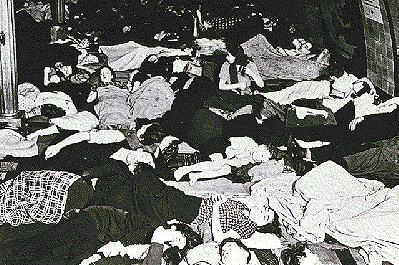 People taking shelter in the London Underground during an air raid.