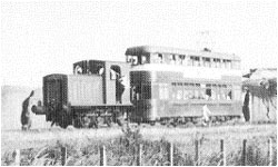 The train being hauled by a diesel locomotive at Middleton